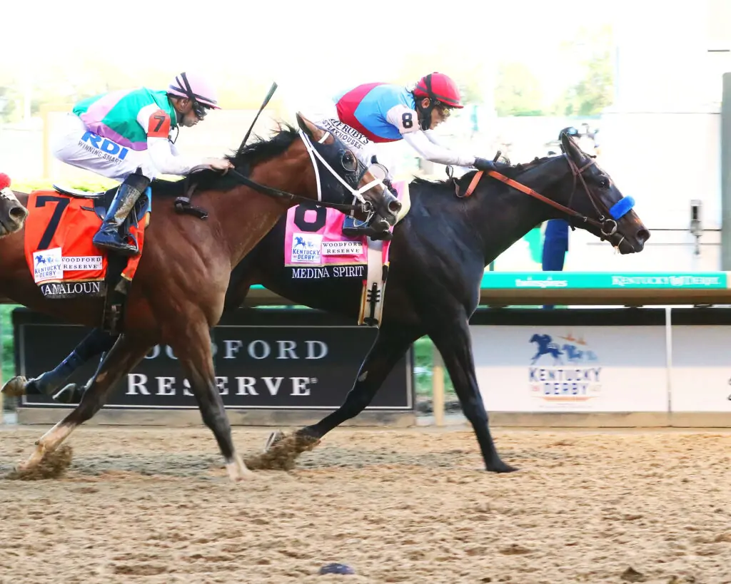 Medina Spirit over Mandaloun by less than a length