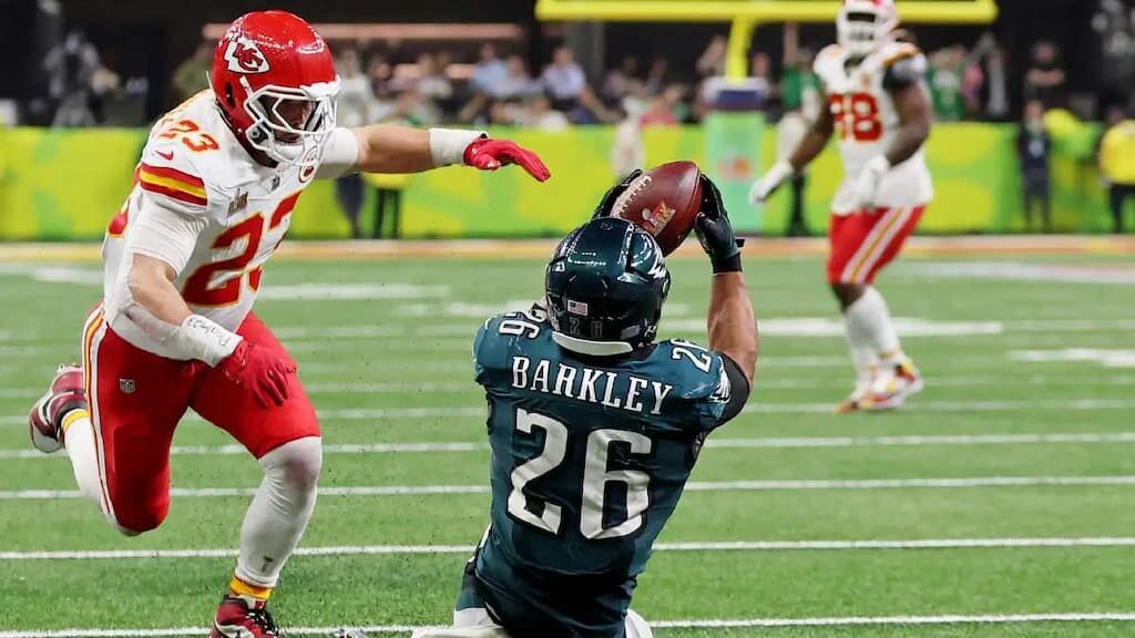 Philadelphia Eagles running back Saquon Barkley catches a pass in Super Bowl 59
