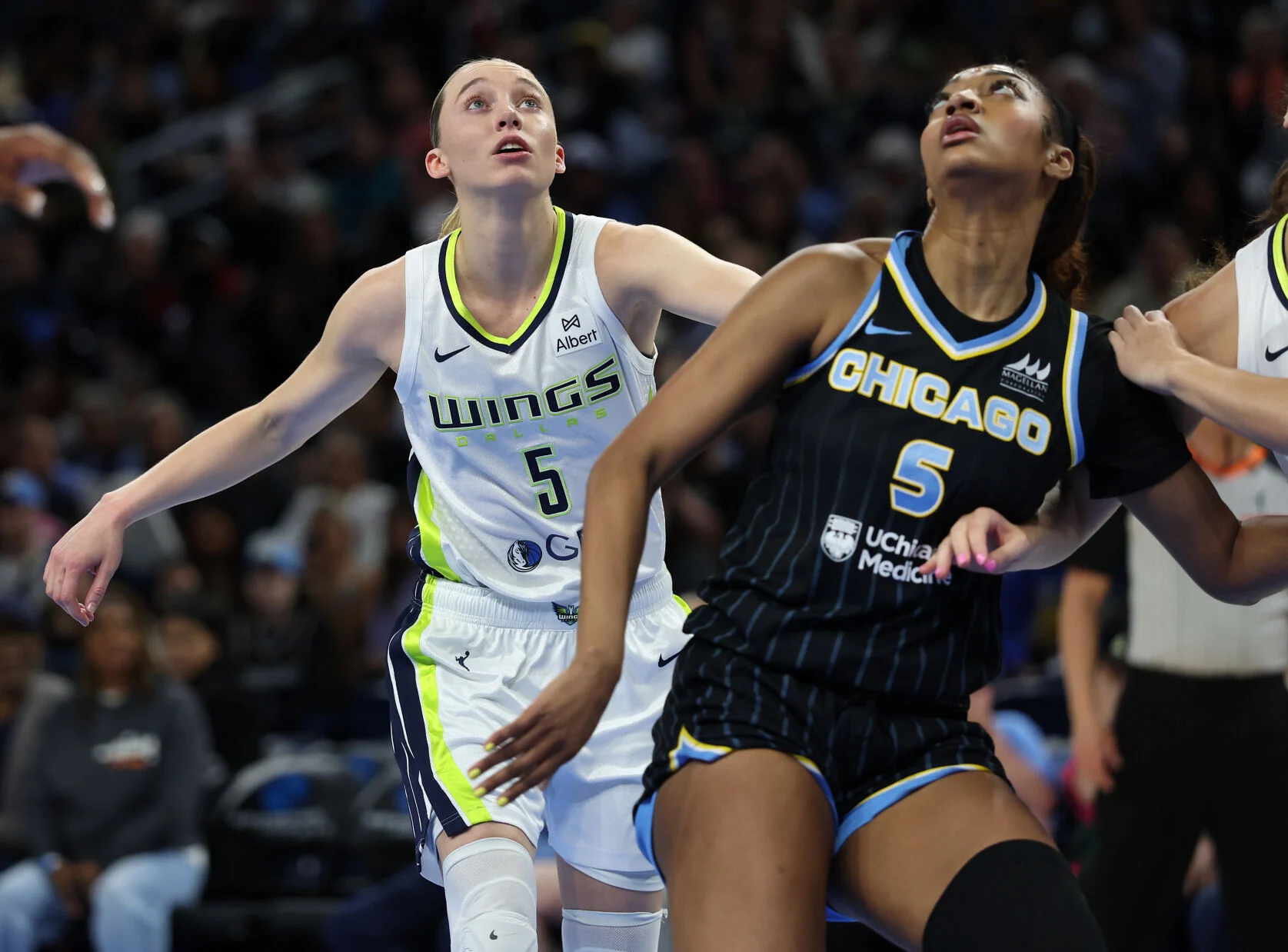 Paige Bueckers and Angel Reese