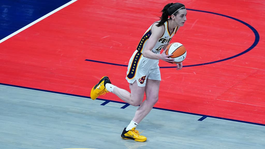 WNBA star Caitlin Clark with the ball during a game