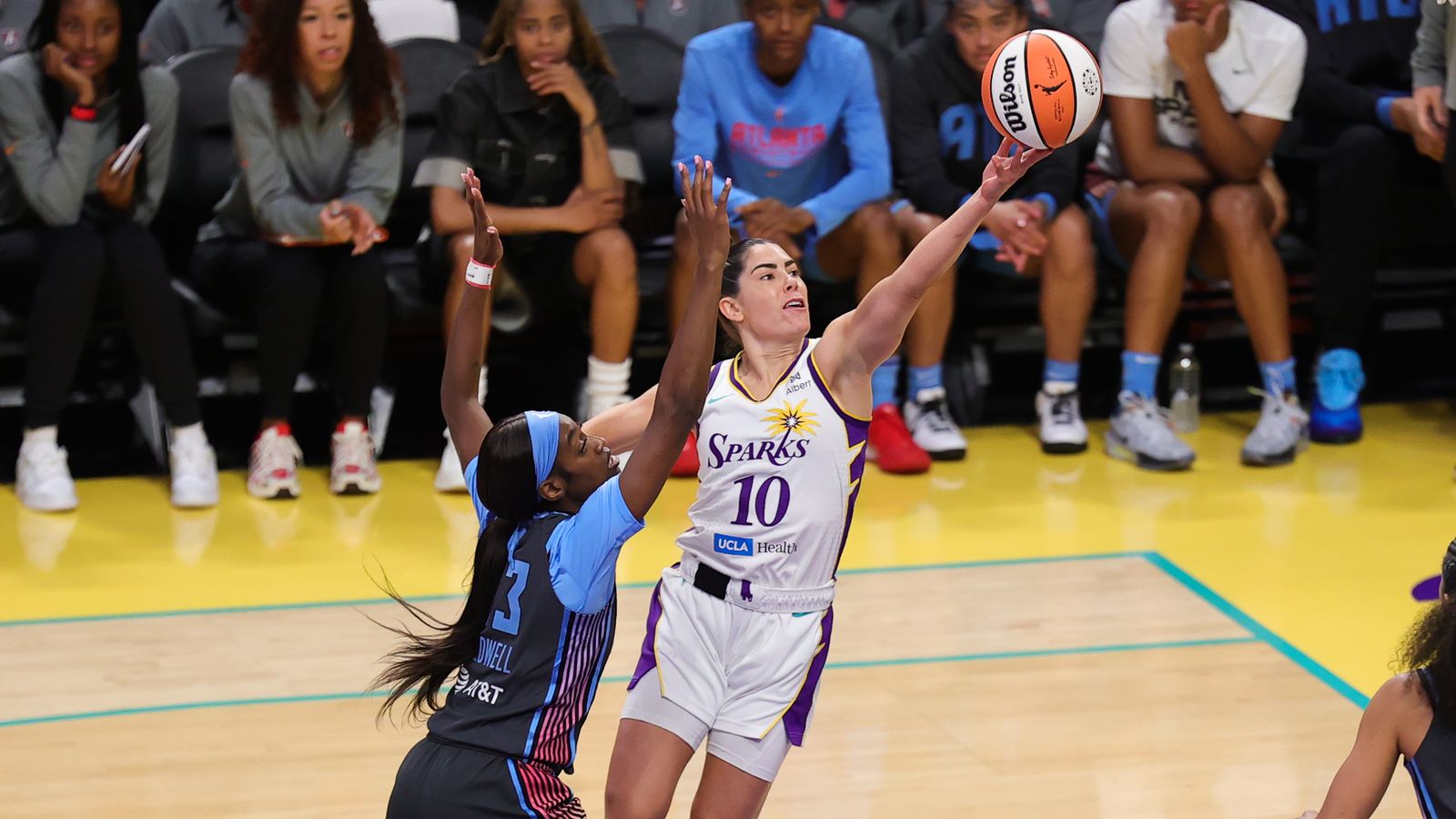 Kelsey Plum and Maya Caldwell