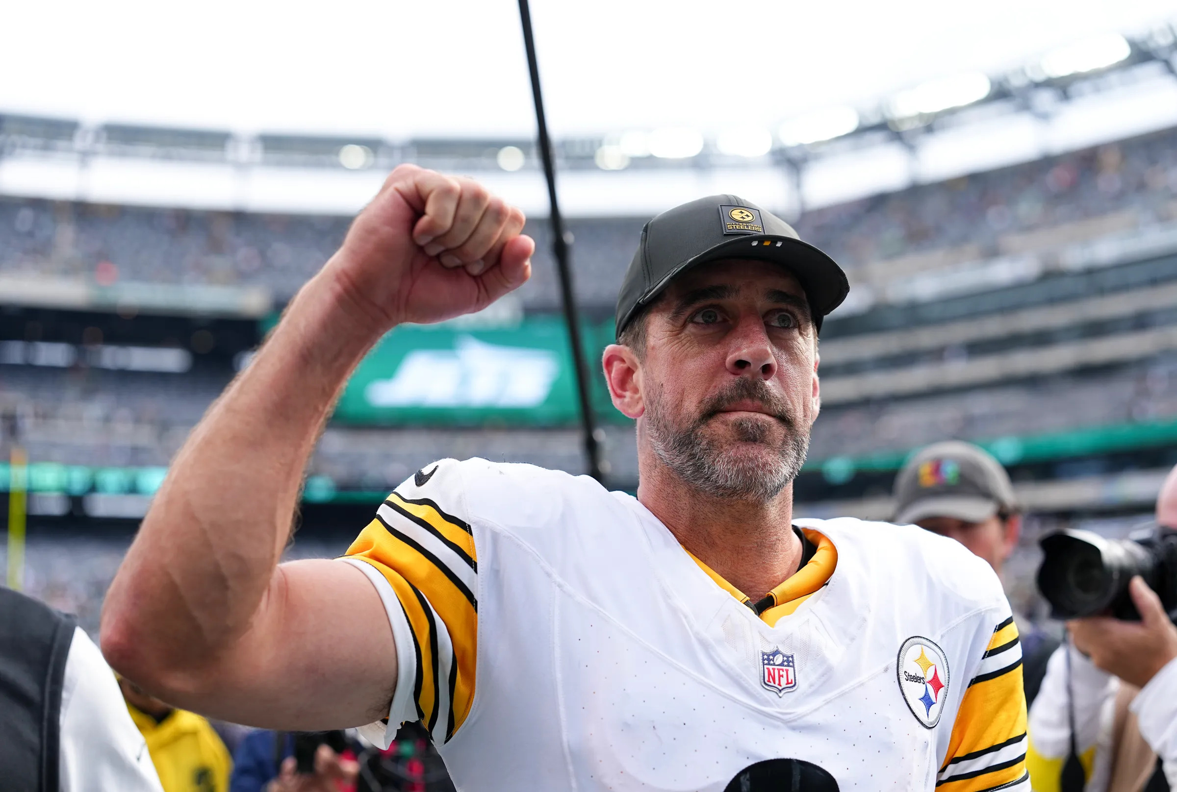 Aaron Rodger celebrates a win in his Steelers debut.