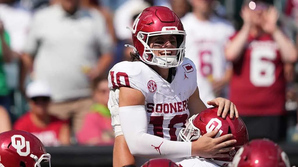 Oklahoma quarterback John Mateer (#10) is a frequent rushing touchdown scorer
