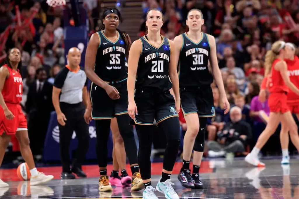 Jonquel Jones (left), Sabrina Ionescu (center), and Breanna Stewart (right) of the New York Liberty