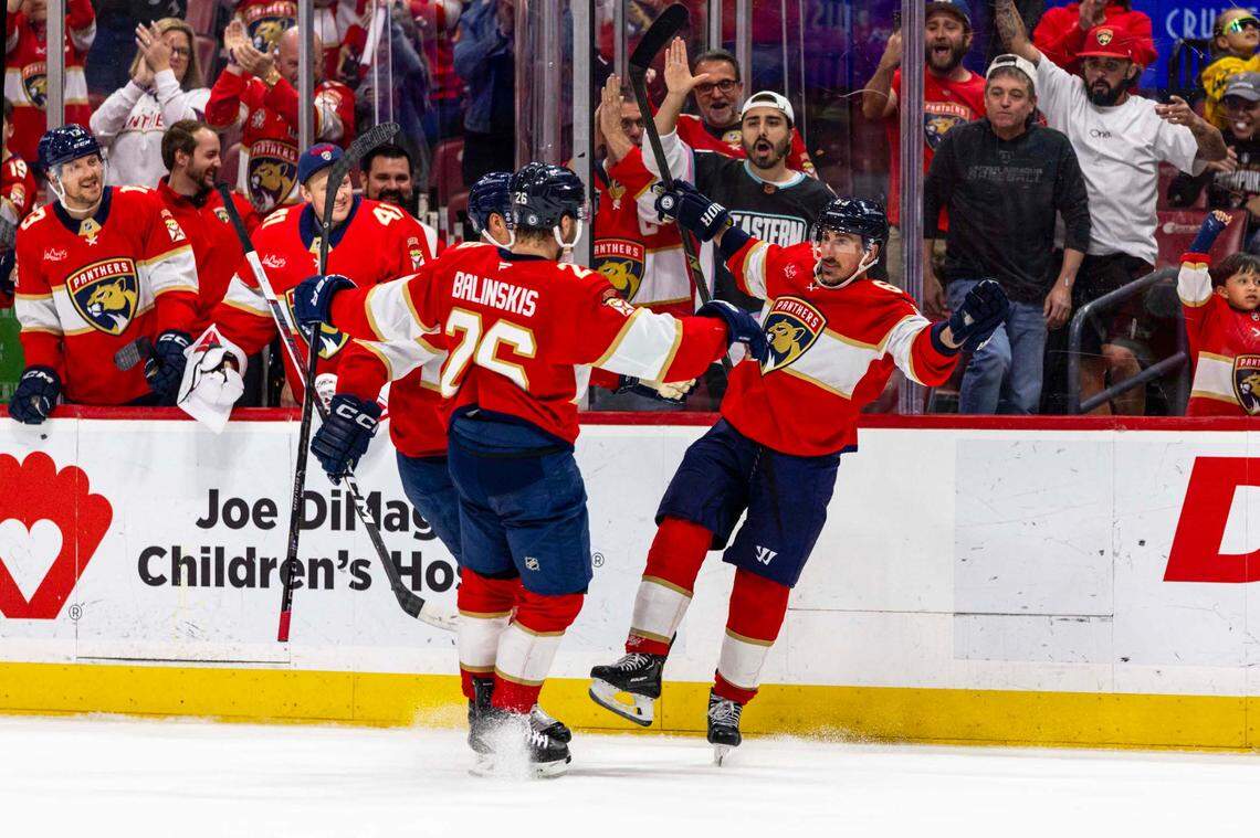 Brad Marchand and Uvis Balinskis