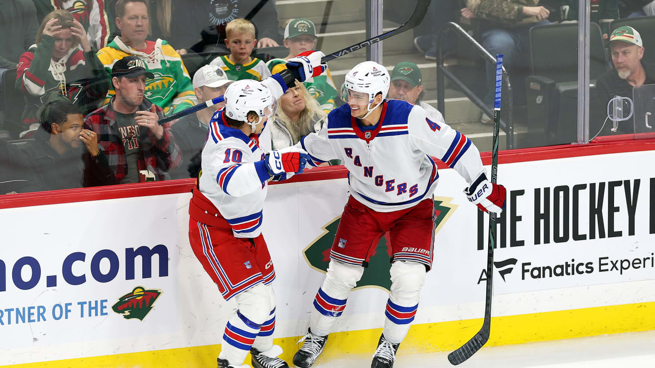 Artemi Panarin and Braden Schneider