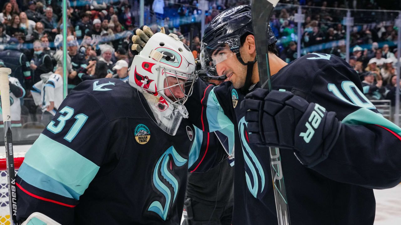 Philipp Grubauer and Matty Beniers