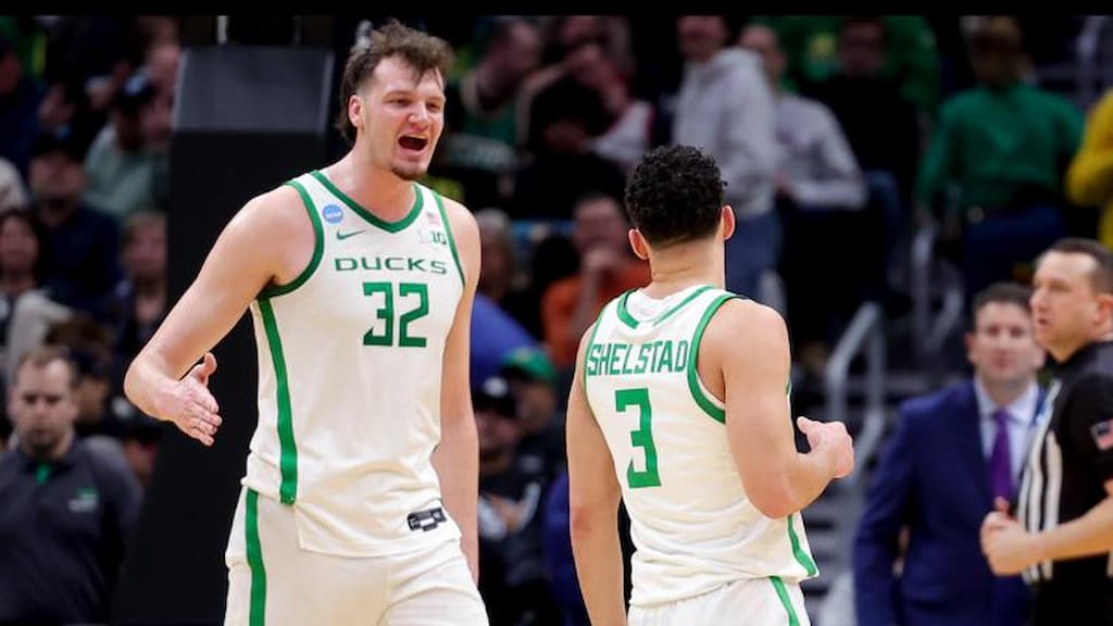 Oregon basketball players Nate Bittle (left, #32) and Jackson Shelstad (right, #3) - Auburn vs. Oregon Prediction & Best Bets (11/24/2025) - Players Era Festival