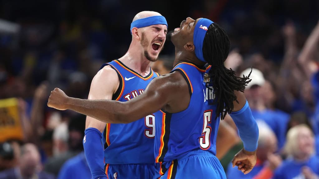 Oklahoma City Thunder teammates Alex Caruso and Shai Gilgeous-Alexander in the 2025 NBA Finals